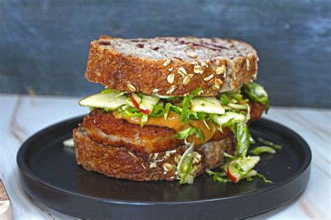 Pork Chop Sandwich With Apple Brussel Slaw And Spicy Honey Mustard