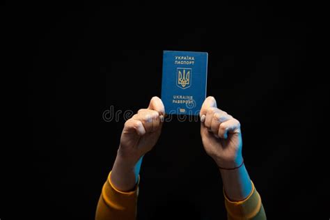 Ukraine National State Biometric Passport In Hands Symbol Of Ukrainian