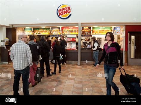 People Queuing At A Burger King Fast Food Restaurant Stansted Airport