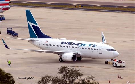 Westjet C GQWJ B737 7CT Charlie Carroll Flickr