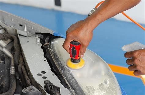 Close-up of person cleaning headlight 1430192 Stock Photo at Vecteezy