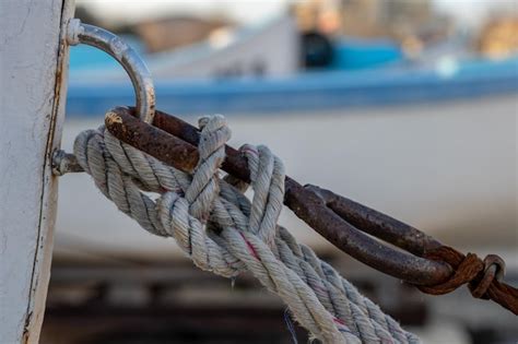 Premium Photo Close Up Of Rope Tied On Rusty Metal