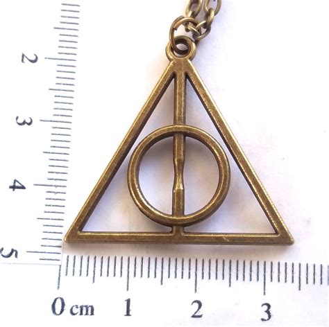 Colar Pingente Harry Potter Relíquias Da Morte Bronze R 16 50 em