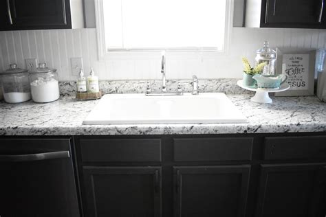 Farmhouse Sink With White Ice Formica Laminate Countertops