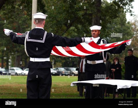 Us Navy Honor Guard Prepare To Fold An American Flag For Presentation