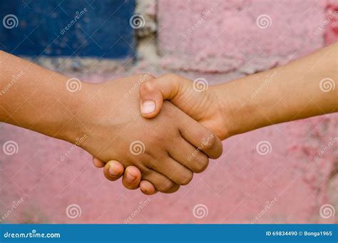 Kids handshake stock photo. Image of deal, friendship - 69834490