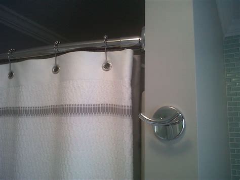 Curved shower rods allow for more shower stall space. | Shower rods ...