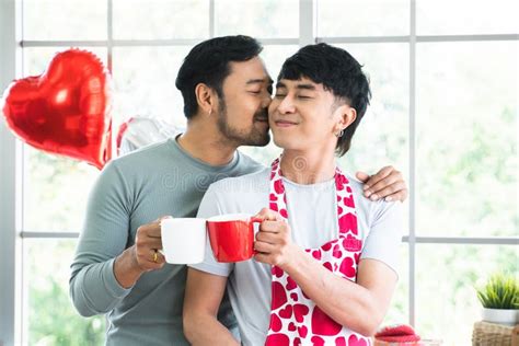 Lgbtq Gay Couple Handsome Men Kissing In Morning In Kitchen At Home