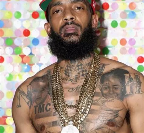 Nipsey Hussle's 31 Tattoos & Their Meaning - Body Art Guru