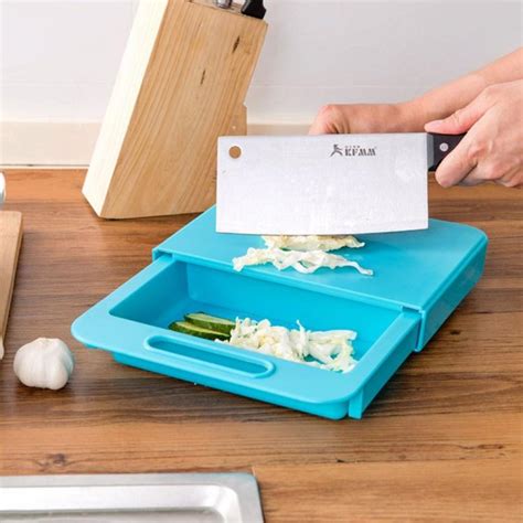 Over-The-Sink Cutting Board Lets You Clean, Chop, and Collect