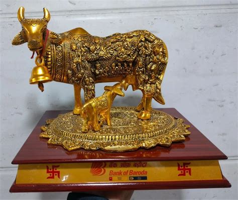 Golden Brass Kamdhenu Cow Calf Statue At Rs Kamadhenu Cow And