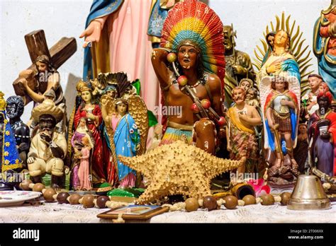 Altar with saints and entities from religions of African origin Stock Photo - Alamy