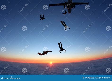 Skydivers Are Jumping Out Of A Plane Stock Image Image Of Clouds