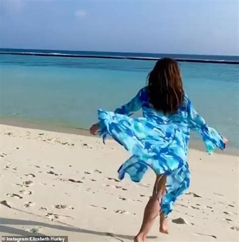 Elizabeth Hurley 54 Shows Off Her Phenomenal Figure In A Tiny Red Bikini Daily Mail Online
