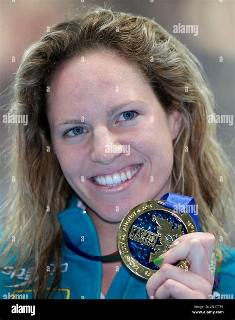 Australia S Emily Seebohm Holds Up Her Gold Medal After Winning The