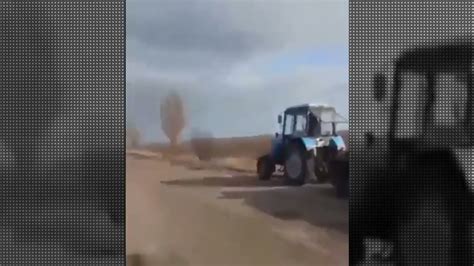 A Ukrainian Farmer Stealing A Russian Military Tank With His Tractor