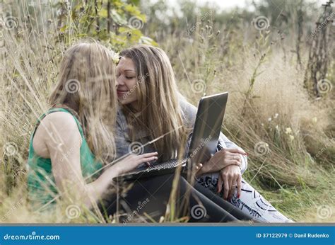 Two Women Friends Sitting Outdoors Together Stock Image Image Of Cute Homosexual 37122979