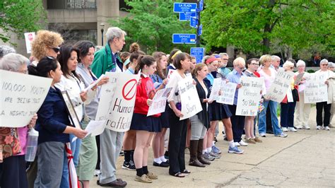 Dozens Gather To Protest Human Trafficking