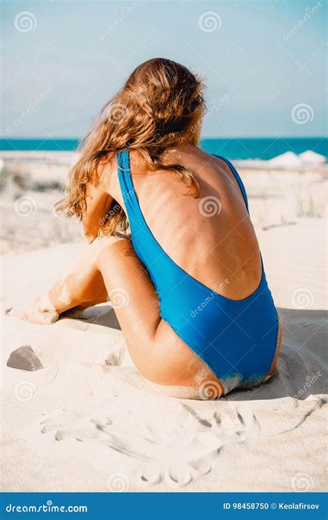 Beautiful Woman In Blue Bikini Sit On Tropical Beach Summer Woman Body