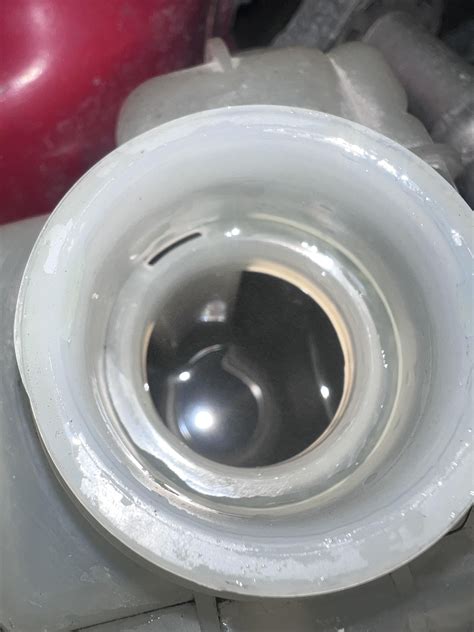 My car overheats. The coolant is now a grayish color not black and