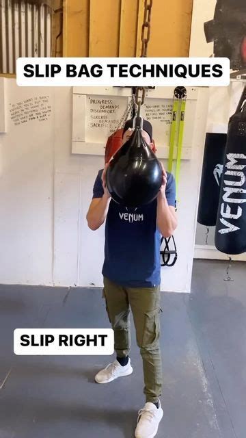 A Man Holding A Punching Bag In A Gym With The Text Slip Bag Techniques