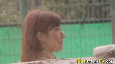 Naked Asian Babe Squats And Urinates