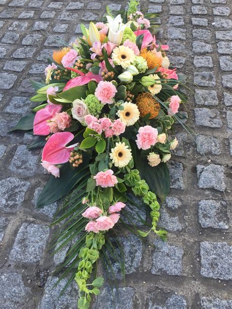 Pink And Peach Casket Spray Welwyn Florist