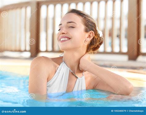 Attractive Young Woman Relaxing In Pool Stock Image Image Of Relaxing