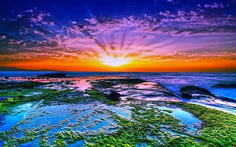 Download Stunning Sunset Over Ocean Wallpaper | Wallpapers.com