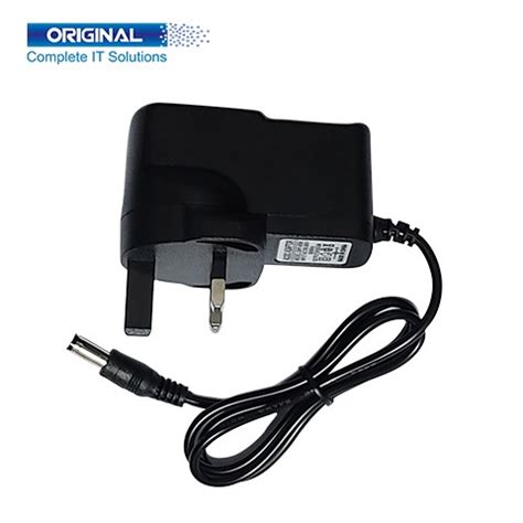 Router Adapter 9V 06A - Original Store Ltd.