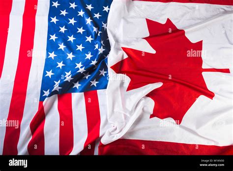 American and Canadian flags together Stock Photo - Alamy