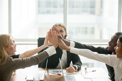 Free Photo Excited Happy Multiracial Business Team Giving High Five