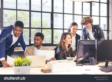 Colleagues Boardroom Discussion Seated Table Together Stock Photo