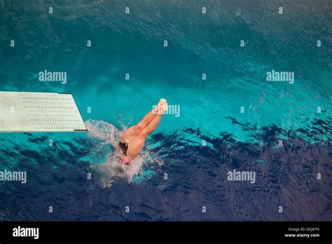 High Diver Jumping Into The Water Stock Photo Alamy