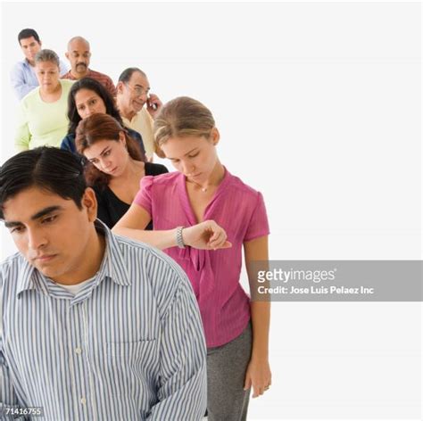 Impatient Waiting In Line Photos And Premium High Res Pictures Getty