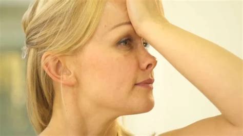 The Blonde Tugs Her Nose And Holds Her F Stock Video Pond