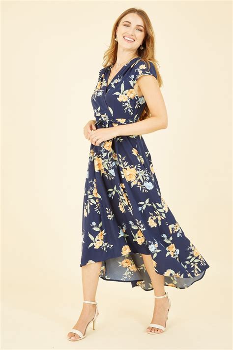 Mela Navy Floral Print Dipped Hem Wrap Dress