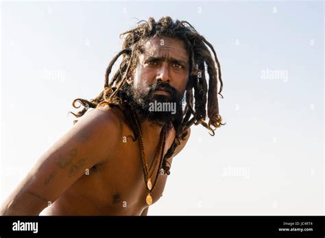 Portrait Of A Sadhu Holy Man On A Platform At The Holy River Ganges