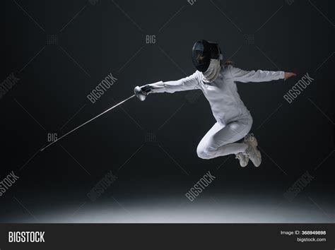 Holding Rapier While Image And Photo Free Trial Bigstock