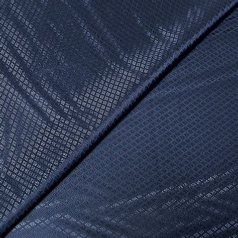 Doublure jacquard acétate viscose Losanges bleus vendue au mètre