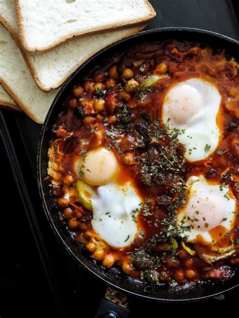 Breakfast Skillet Of Poached Eggs In Chickpeas And Tomato Sauce Shakshouka Island Smile