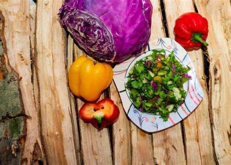 Premium Photo | Picture of salad with fresh vegetables