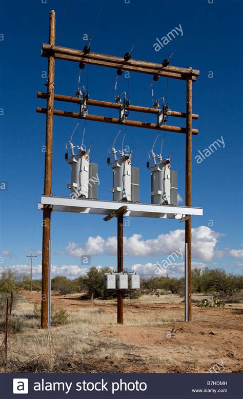 Three Voltage Regulators Mounted On Power Poles Stock Photo Royalty