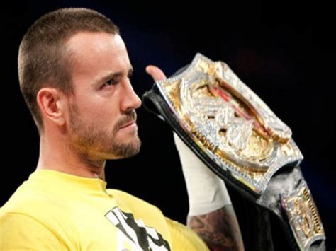 WWE: CM Punk presents his WWE championship belt as Christmas gift ...