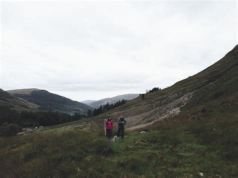 Couple trekking Glen Etive, Scotland | Premium Photo - rawpixel