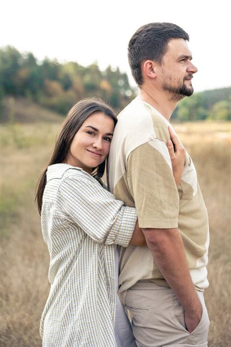 Happy Mature Man And Woman Hugging While Standing In The Field Stock Image Image Of Hugs