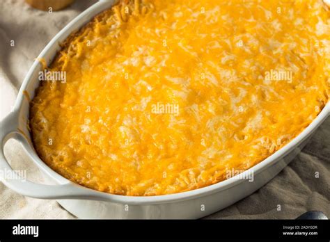 Homemade Corn Pudding Casserole with Cheddar Cheese Stock Photo - Alamy