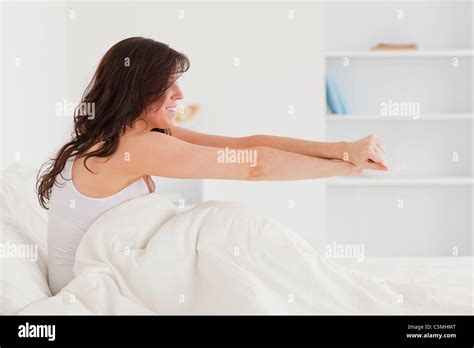 Good Looking Brunette Female Posing While Stretching Stock Photo Alamy