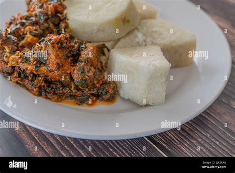 A Plate of boiled yam with spicy Vegetable Stew Stock Photo - Alamy