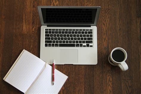 Macbook Laptop With Journal Book Coffee Good Stock Photos